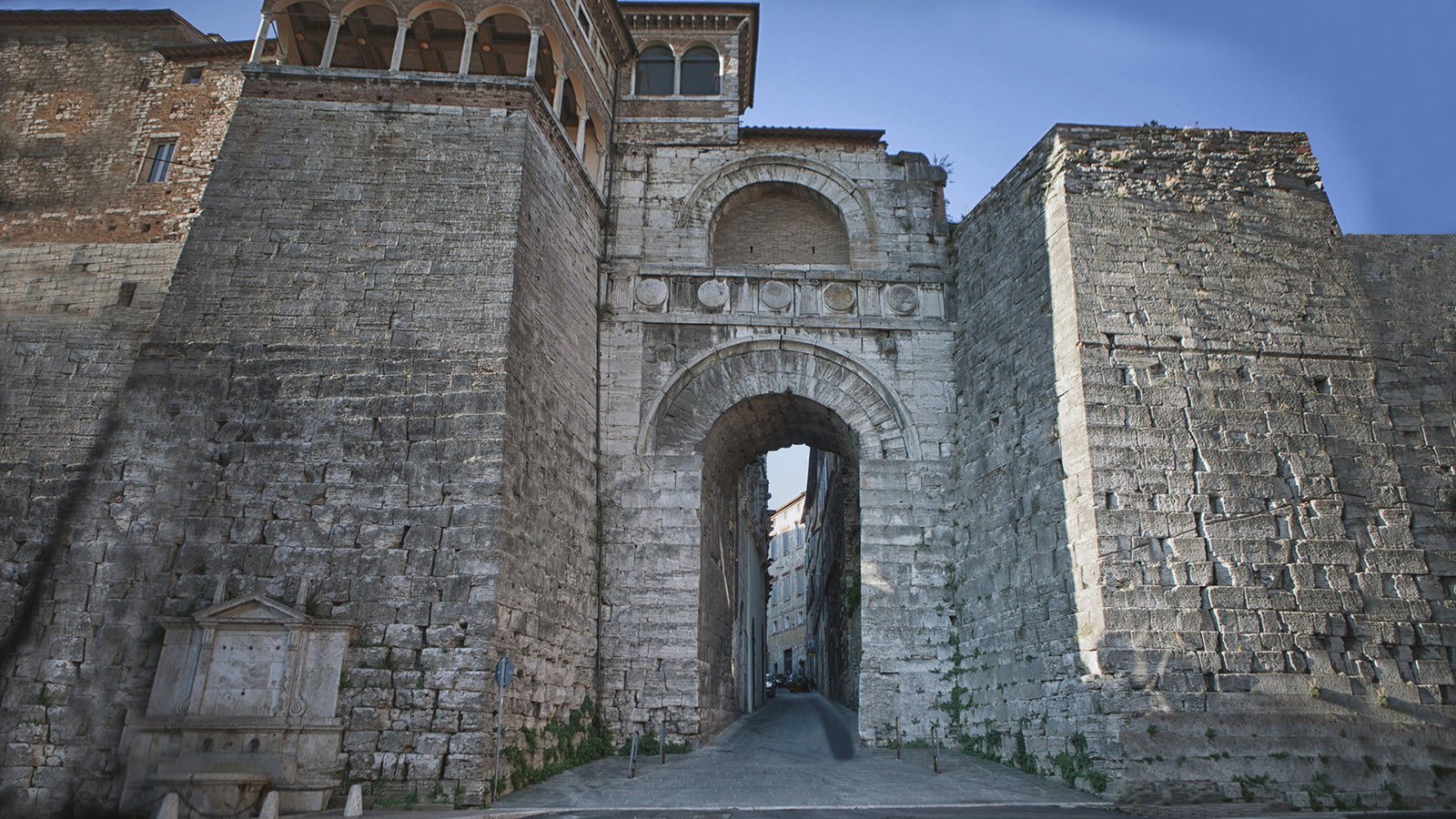 The Etruscan Arch, an ancient stone gate in the walls of Perugia.