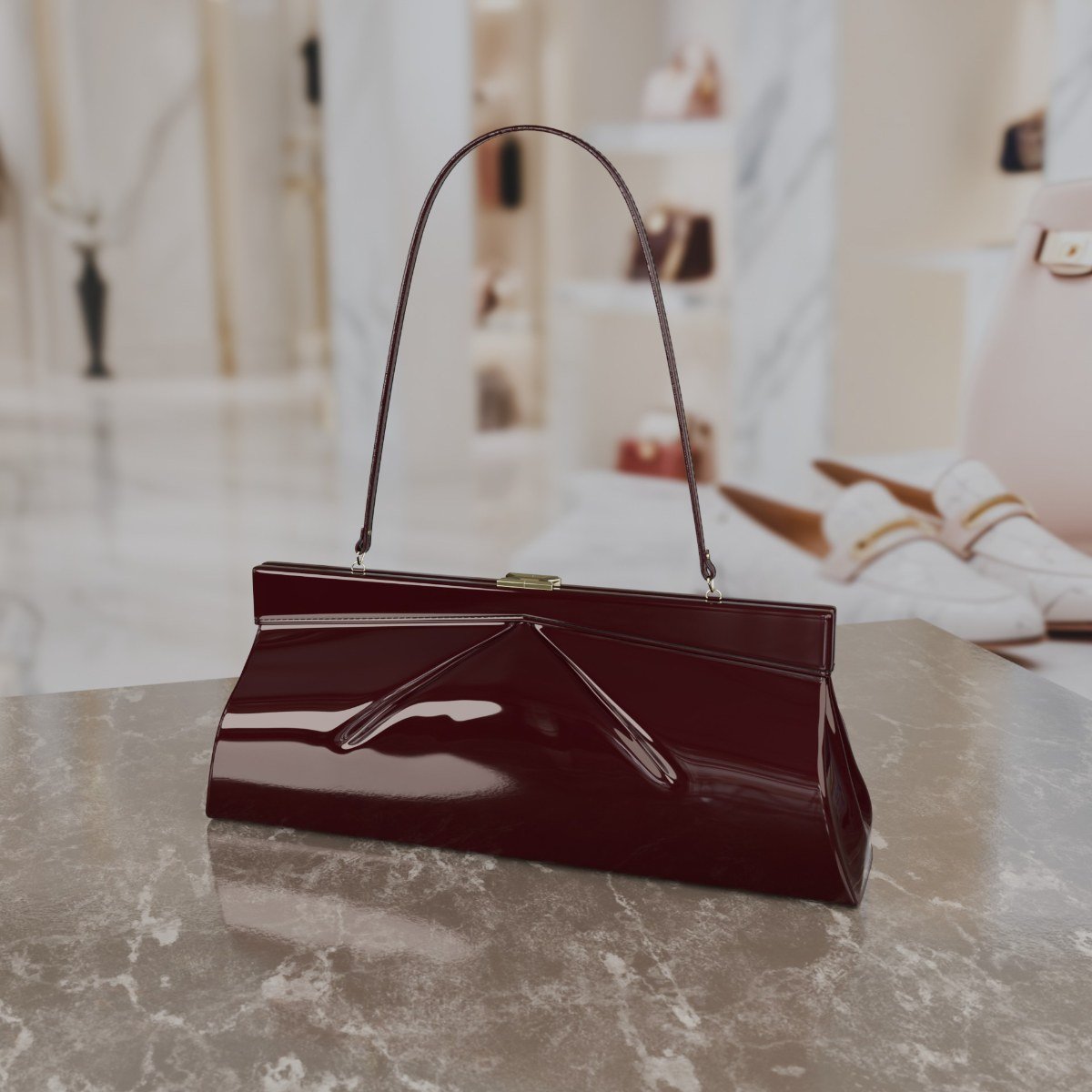A glossy burgundy leather bag with a slim top handle, standing on a marble counter.